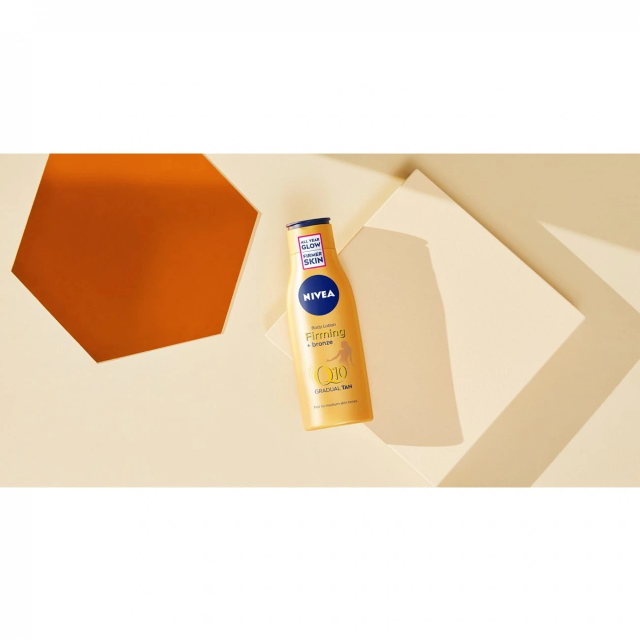 Nivea Q10 Firming + Bronze Body Lotion 200ml (6.76fl Oz) 4 Nivea Q10 Firming + Bronze Body Lotion 200ml (6.76fl Oz) – Image 2